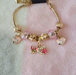 Gold Charm Bracelet with Pink Accents
